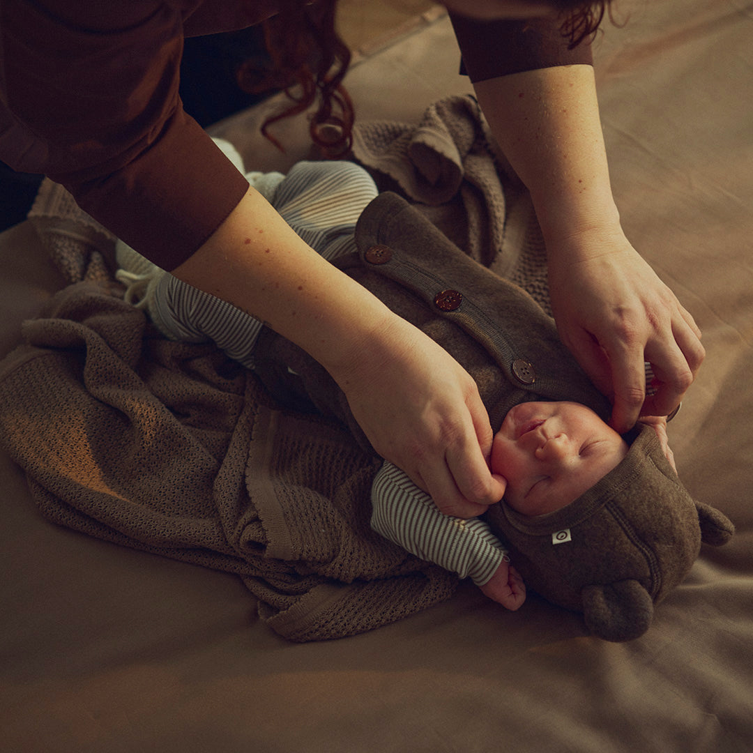müsli Babyweste aus Merinowolle Wool Walnut melange 821000012